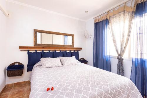Giường trong phòng chung tại Villa Gaia