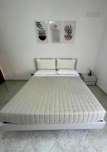 Ένα ή περισσότερα κρεβάτια σε δωμάτιο στο LIKE HOME