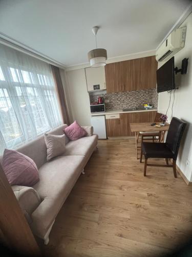 Η κουζίνα ή μικρή κουζίνα στο Aycan Sultan Apart Hotel