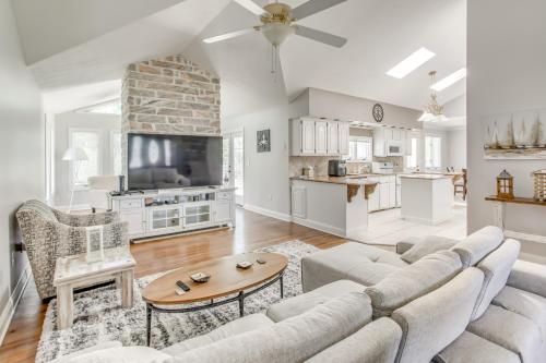 a living room with a couch and a table at Dine, Shop and Splash Family Home in Myrtle Beach in Myrtle Beach