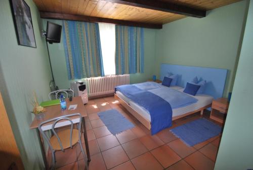 Tempat tidur dalam kamar di La Promenade