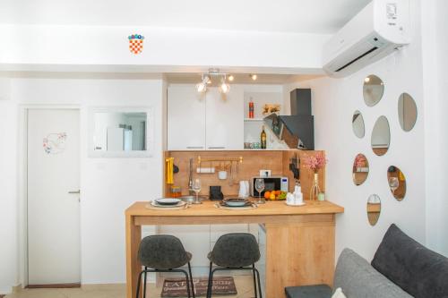 Η κουζίνα ή μικρή κουζίνα στο Studio apartman MATEO