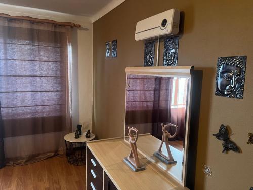 a kitchen with a counter with two awards on it at apartamento vagos in Vagos