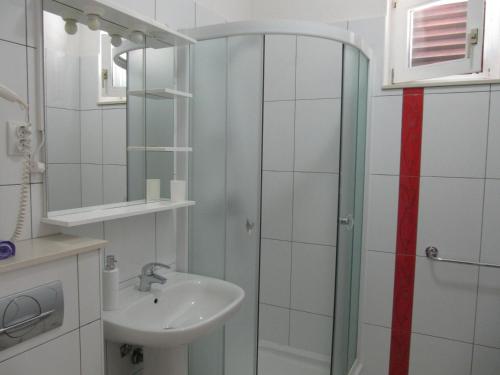 Koupelna v ubytování Rooms Falcon