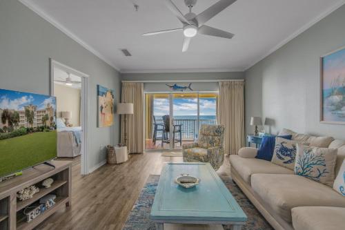 a living room with a couch and a tv at Marlin Key 4C by Vacation Homes Collection in Orange Beach