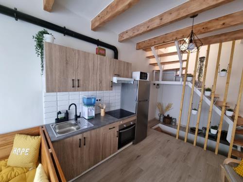 Kuchyň nebo kuchyňský kout v ubytování Casiña Ermi