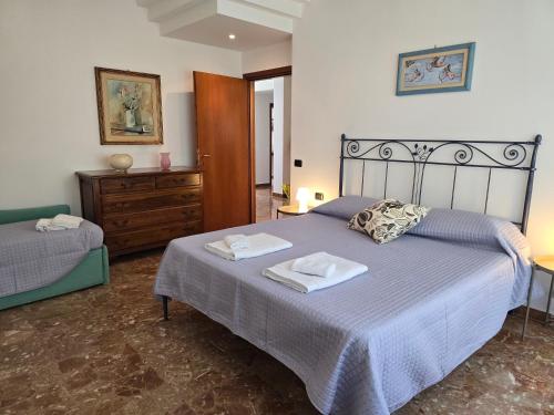 Katil atau katil-katil dalam bilik di Art & Mare Apartment
