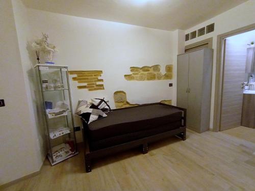 Ένα ή περισσότερα κρεβάτια σε δωμάτιο στο pesa apartment B&B