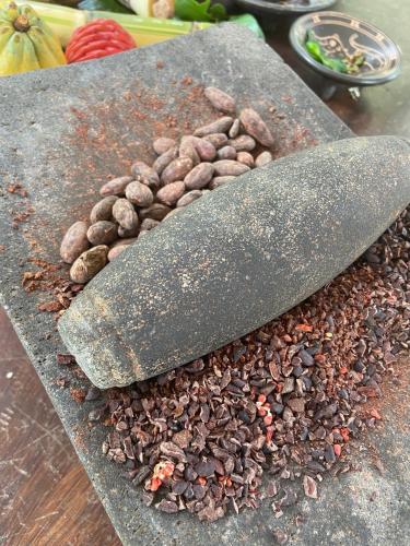 a bunch of coffee beans sitting on a table at Chachagua Rainforest Hotel & Hot Springs in Fortuna