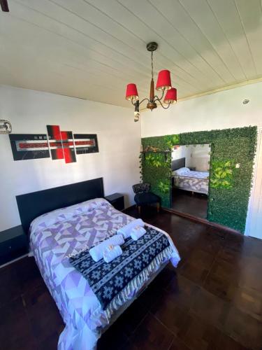 a bedroom with a bed and a fireplace at Exclusiva casa céntrica in Chascomús
