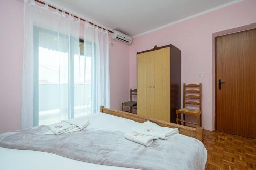 Posteľ alebo postele v izbe v ubytovaní Apartment Zubovici 16063a