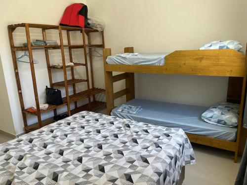 Cama o camas de una habitación en Apto super amplo e confortável