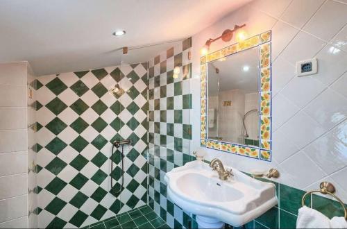 a bathroom with a sink and a mirror at Holiday house with a swimming pool Buzet, Central Istria - Sredisnja Istra - 22842 in Buzet