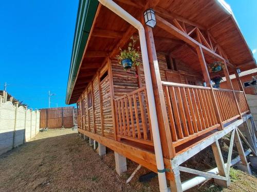 a large wooden building with a planter on it at Cabaña Gitana - Magical and WINDY nature getaway! in Jardín