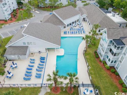 an aerial view of a house with a swimming pool at 2BR/2BA Condo at Arcadian Dunes Building 10-238 in Myrtle Beach