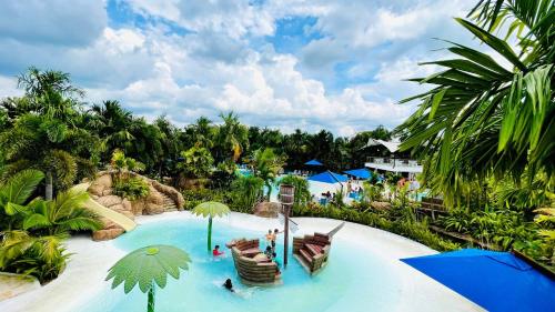 an aerial view of a water slide at a resort at Hotel Playa Maui in Guamal