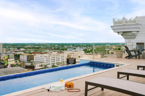 a view from the roof of a building with a swimming pool at Roami at Duncan Plaza in New Orleans