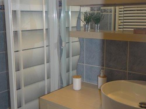 a bathroom with a sink and a shower at Appartement Cavalaire-sur-Mer, 3 pièces, 4 personnes - FR-1-100-337 in Cavalaire-sur-Mer