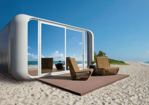 um grupo de cadeiras sentadas numa praia em Dreams Curacao Resort, Spa & Casino em Willemstad