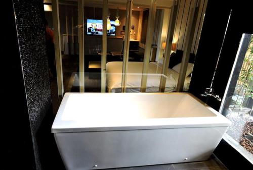 Ett badrum på Roppongi Motel - Dalian