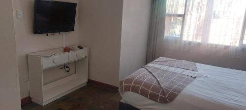 Una cama o camas en una habitación de Wilmots on Dixon