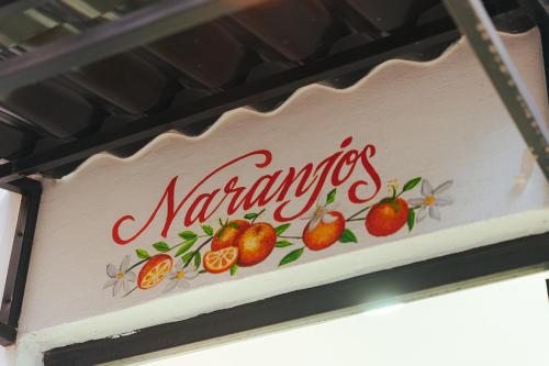 a sign for a pharmacy with strawberries on it at Casa Don José: NARANJOS Suite in Oaxaca City