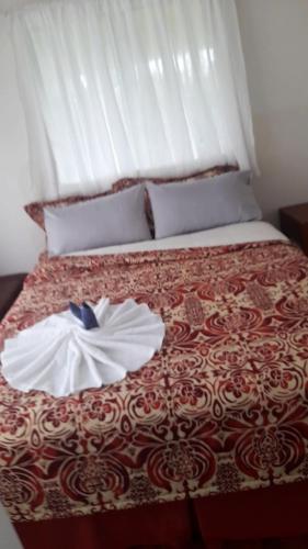 En eller flere senge i et værelse på Tofoa 2