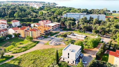 an aerial view of a small town with buildings at CUBE S in Medulin