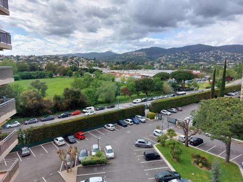 an aerial view of a parking lot with cars at BRUYERES - 3 pièces - Axelle Loc'Appart in Mandelieu-la-Napoule
