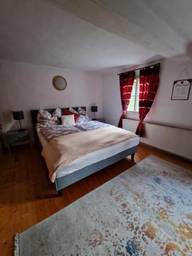 Säng eller sängar i ett rum på Natur- & Erlebnis Ferienhaus