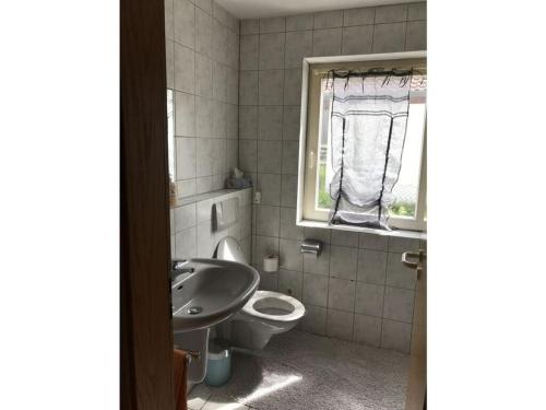 Ένα μπάνιο στο Holiday apartment Peacock