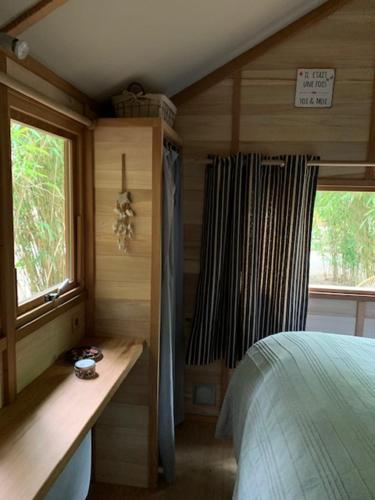 Katil atau katil-katil dalam bilik di Lodging Le Lac