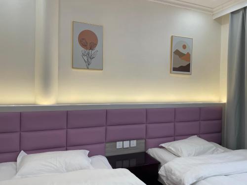 Postel nebo postele na pokoji v ubytování Youranju Guesthouse