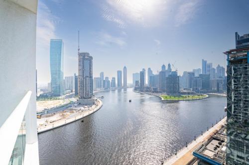 Escape24 Stylish 2BR Apartment at Damac Maison Privé, Business Bay with Canal View