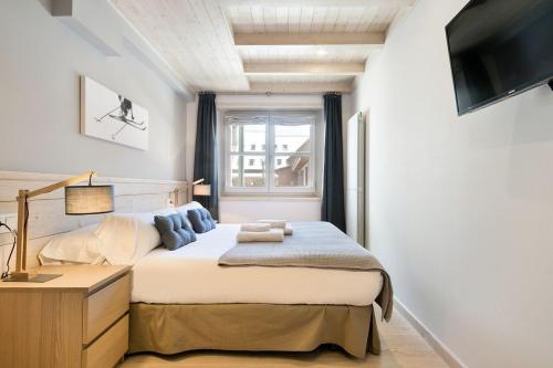 Krevet ili kreveti u jedinici u okviru objekta Luderna - Apartamento Val de Ruda A24 de Ribereta