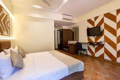 TV a/nebo společenská místnost v ubytování Zaras Resort Khandala