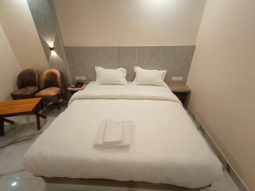 Säng eller sängar i ett rum på Hotel GD Grand Inn