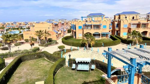 an aerial view of the water park at the resort at فيلا توين هاوس مميزة في قرية رويال بيتش رأس الحكمة villa twin house Royal Beach Ras El Hekma in Marsa Matruh