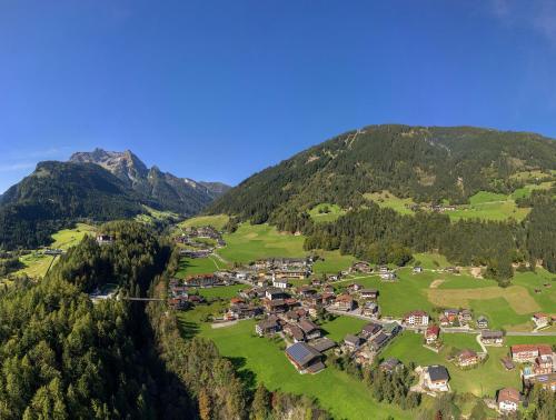 an aerial view of a village in the mountains at Haus Sonnegg in Finkenberg