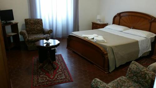 Un pat sau paturi într-o cameră la Il Cucù B&B