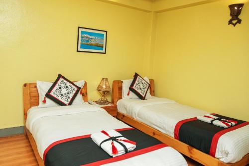 Una cama o camas en una habitación de Peace and Joy Guest House