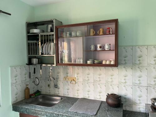 Kuchyň nebo kuchyňský kout v ubytování Kasaa Home