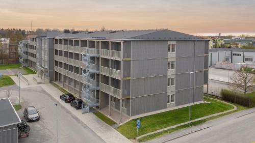 an aerial view of a building with a spiral at Uppsala Hotel Apartments in Uppsala