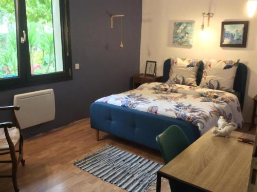 Postel nebo postele na pokoji v ubytování Chambre Double La Cigale Insolite