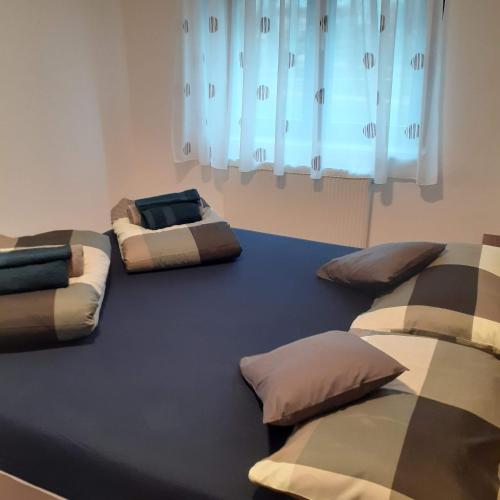 a room with four pillows on the floor at Mabela in Virovitica