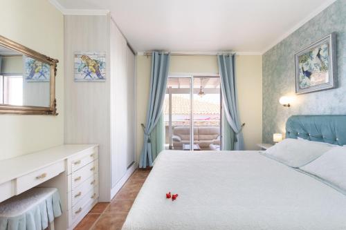 Giường trong phòng chung tại Villa Gaia