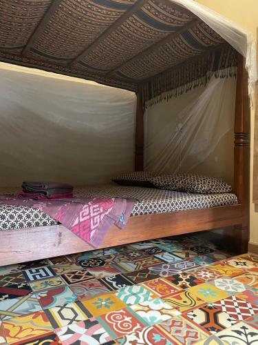 Кровать или кровати в номере Bedhot Homestay