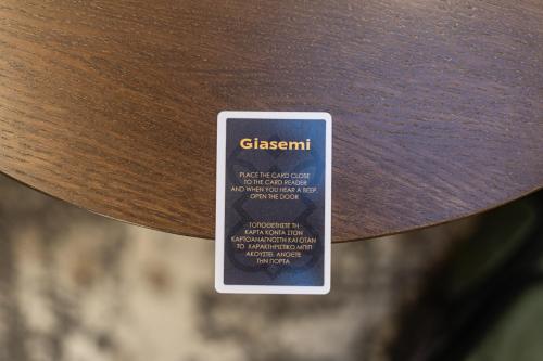 a close up of a wooden table with a sticker on it at FLOARA DI MUNTE Forest Luxury Suites in Metsovo