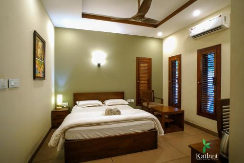 Posteľ alebo postele v izbe v ubytovaní KAILANI BEACH RETREAT - Ayur Yoga Retreats