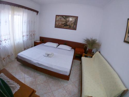 Cama o camas de una habitación en Oceanfront Outlook Rooms